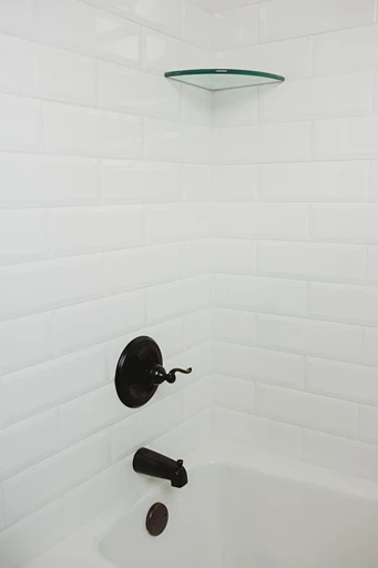 White subway tile with black hardware 
